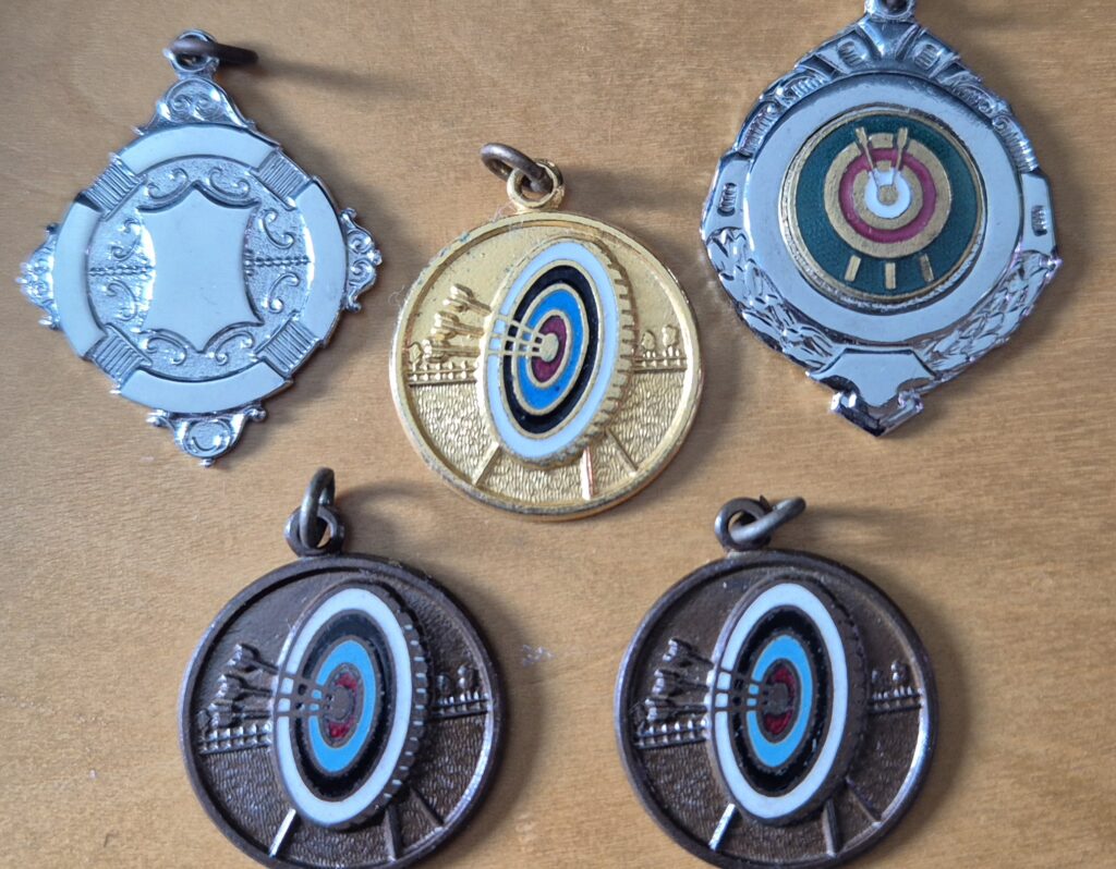 five medals for archery